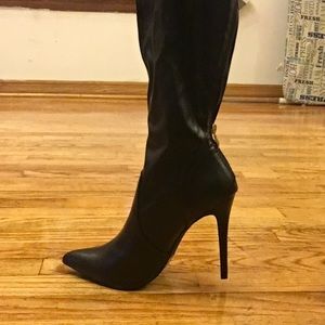 Black leather heel boots